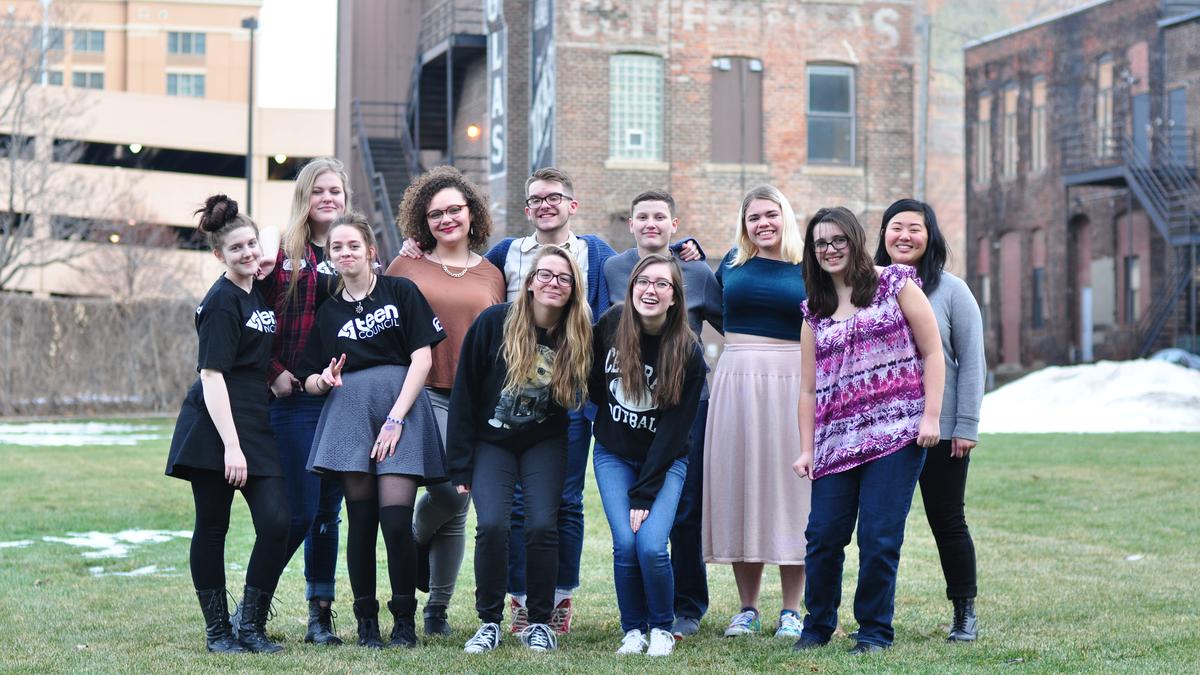 A picture of Omaha teens who are Teen Council peer sexuality educators. Some of them wear t-shirts with Teen Council logo on them.